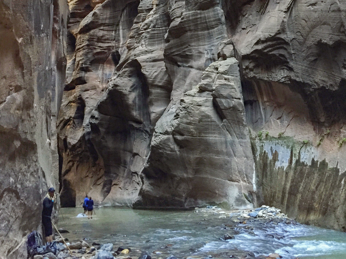 Narrows hike in Zion National Park leads through beautiful blue water
