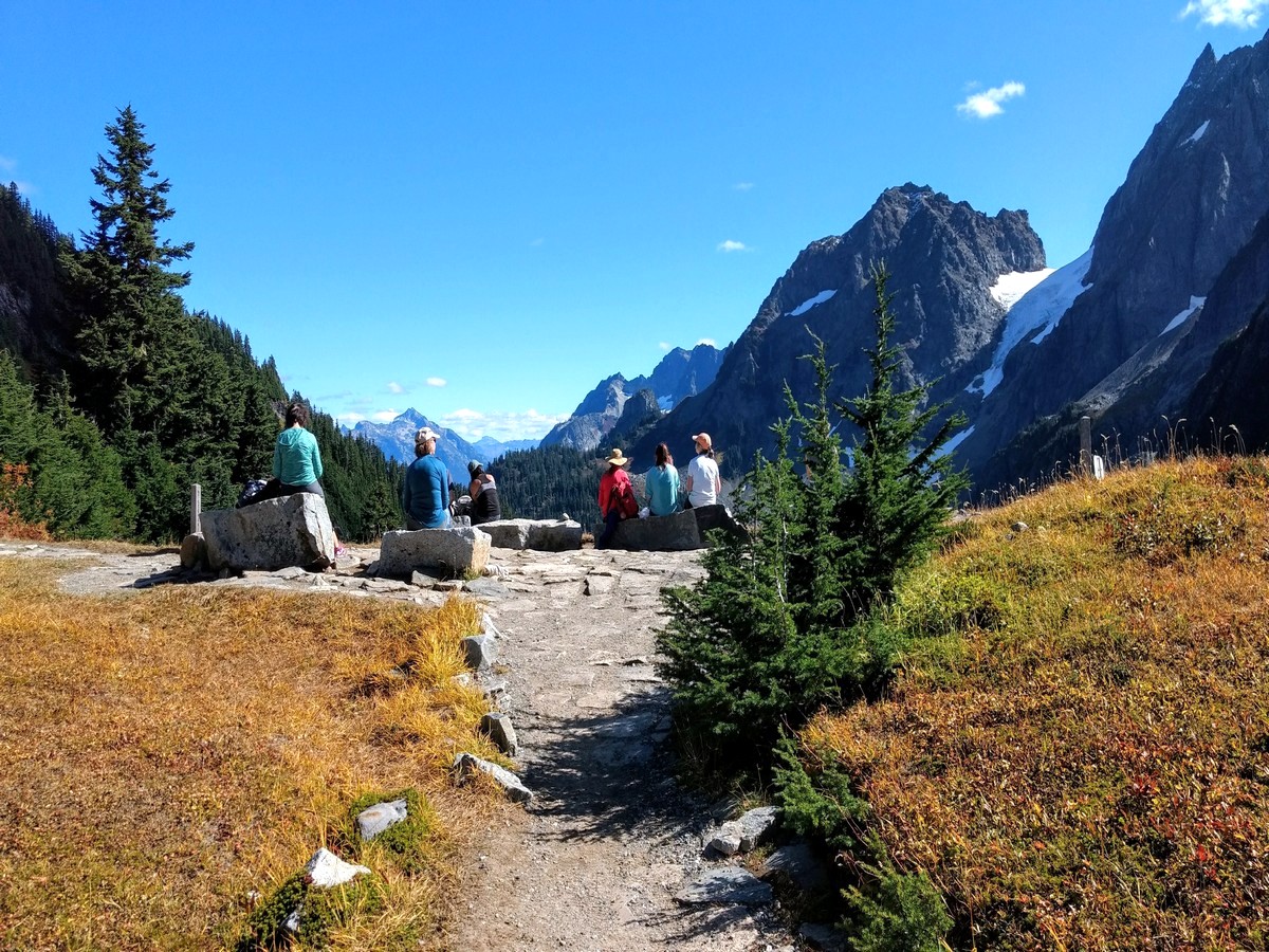 Reaching the pass on the Cascade Pass Hike in North Cascades, Washington