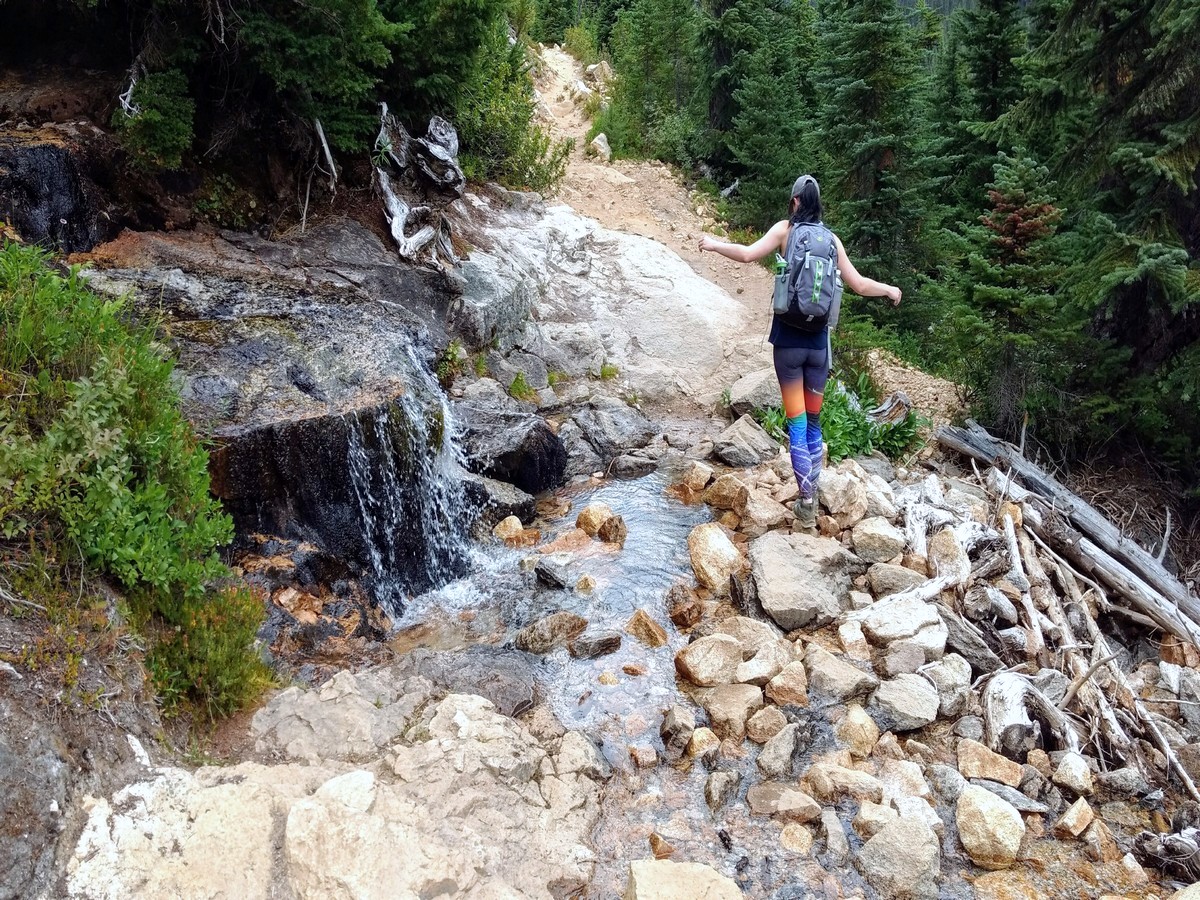 Crossing the creek on the Cutthroat Pass Hike in North Cascades National Park, Washington