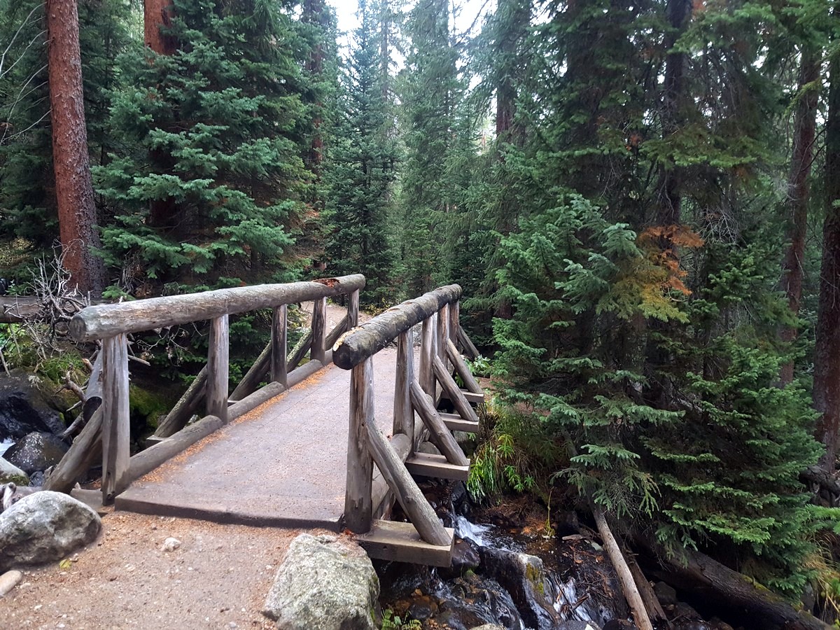 Bridge crossing on the Ouzel Falls Hike in the Rocky Mountain National Park, Colorado