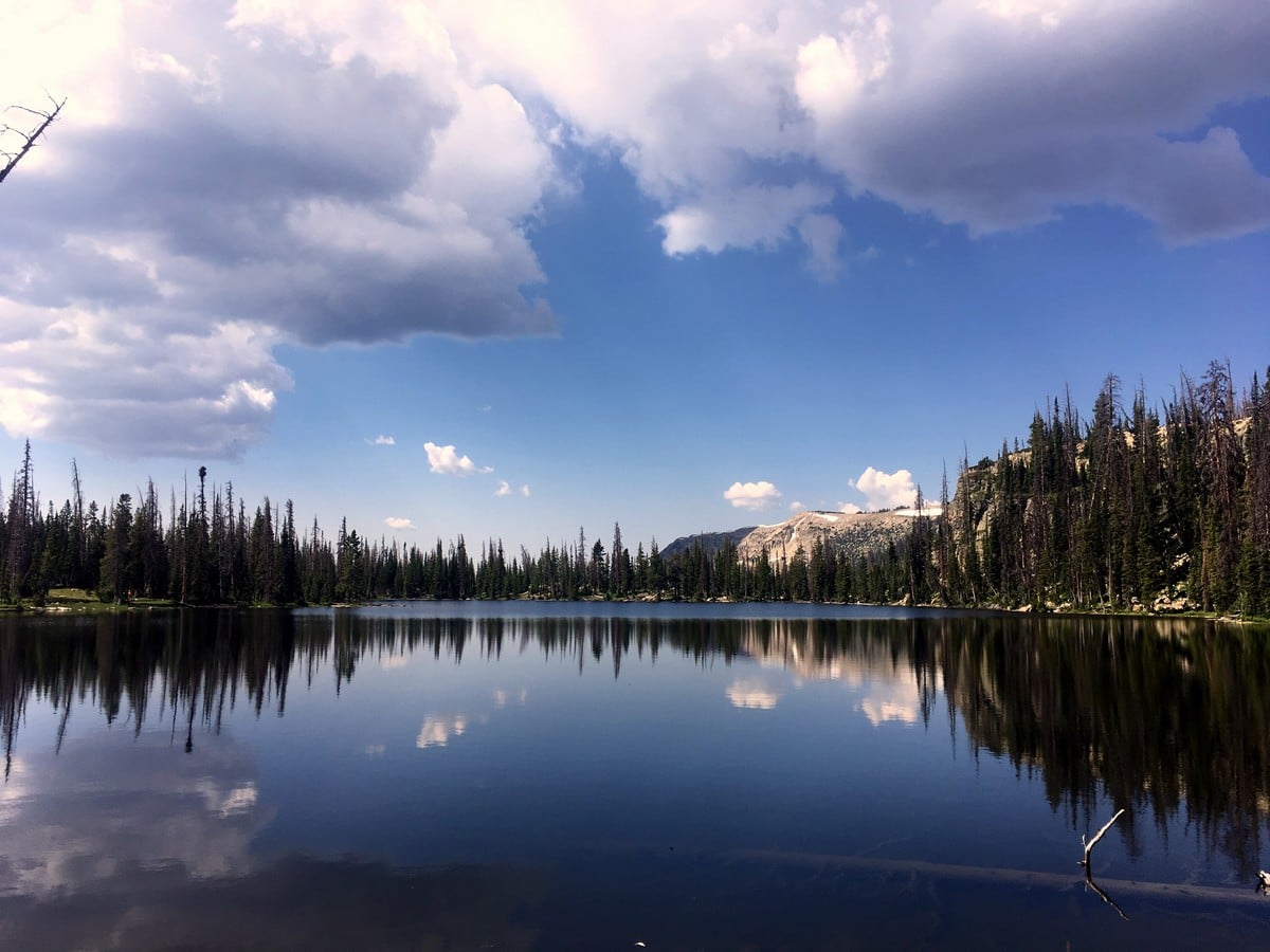 The quintessential view of the lake on the Clyde Lake hike in the Uinta Mountains, Utah