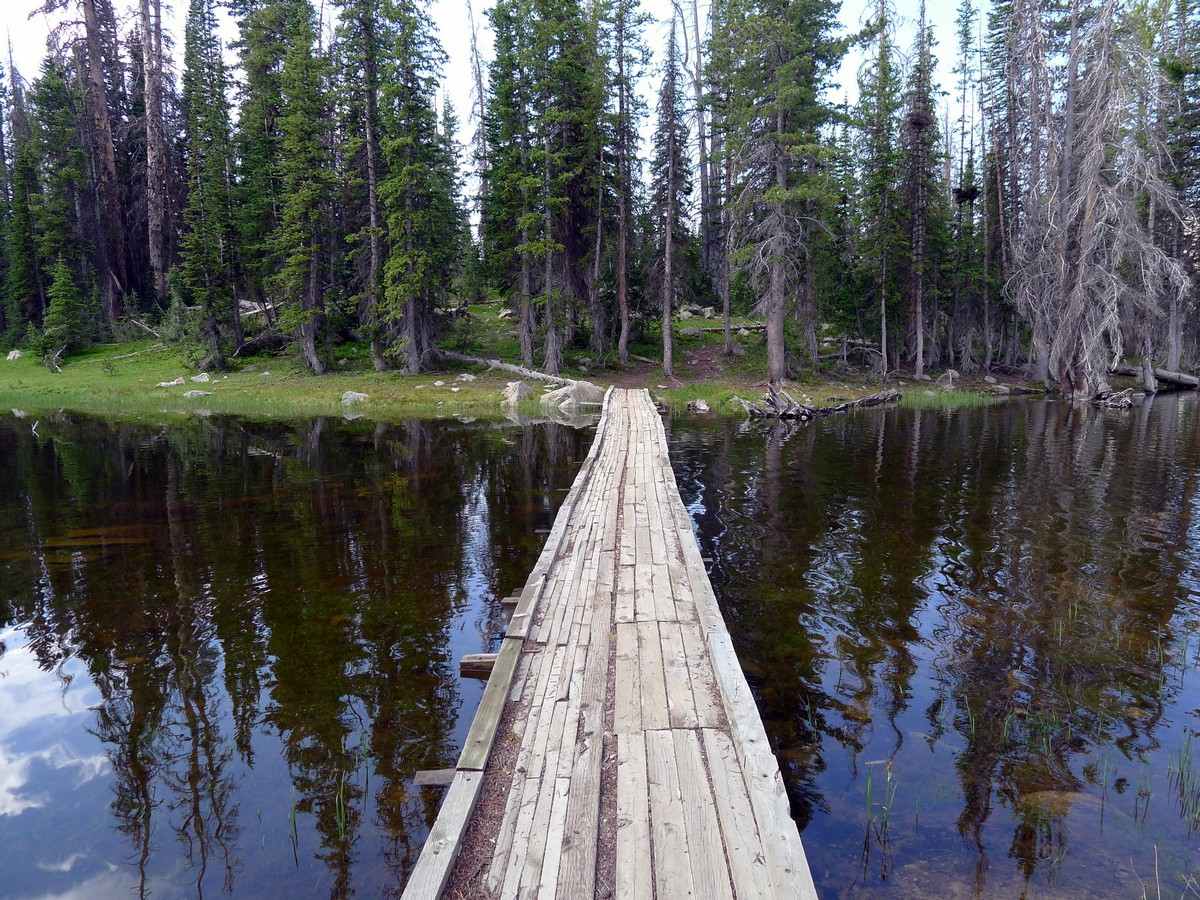Haystack Lake in Uinta Mountains can be reached by crossing the bridge
