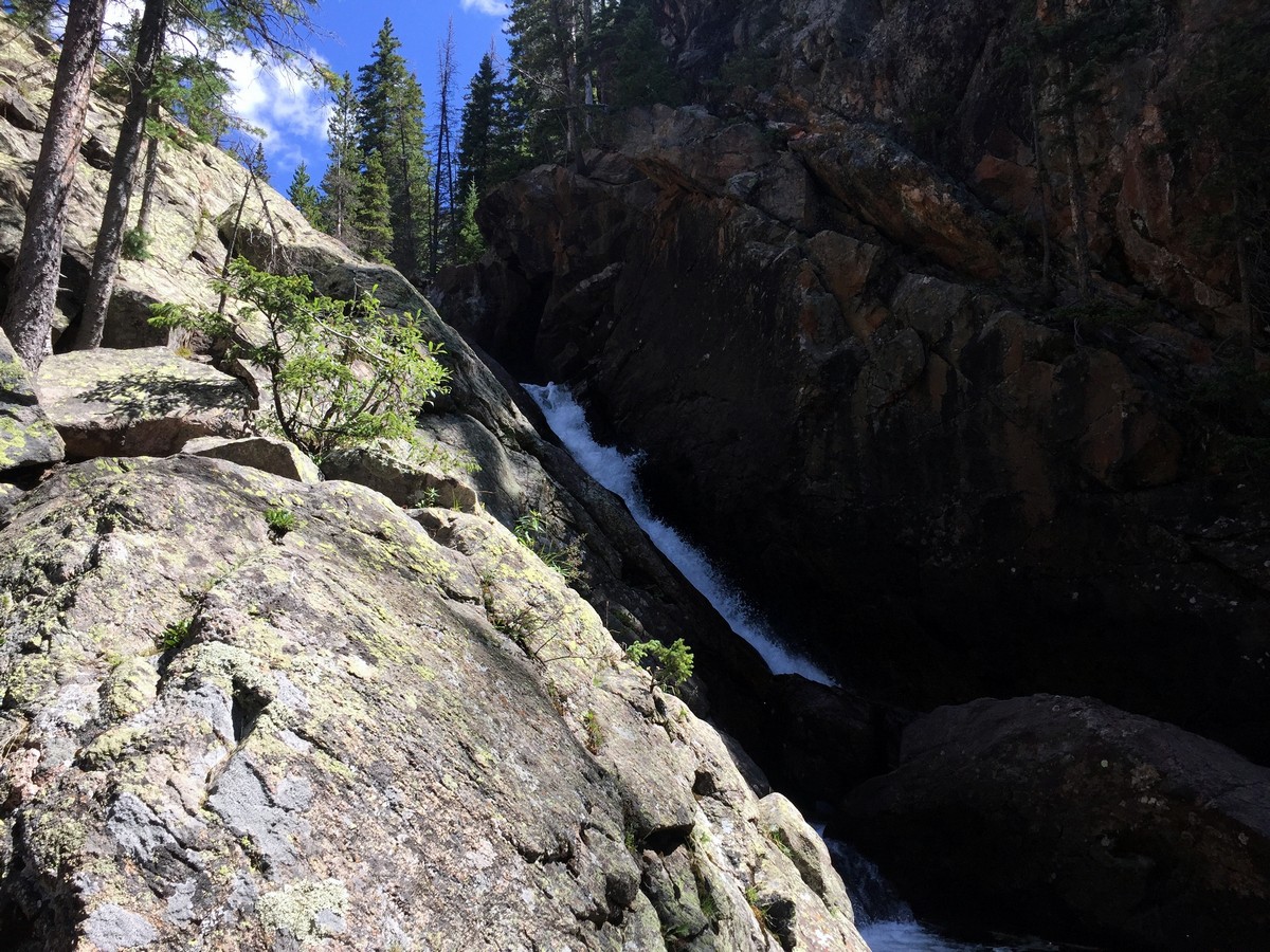Cascading waterfall on the Upper Piney River Falls Trail Hike near Vail, Colorado
