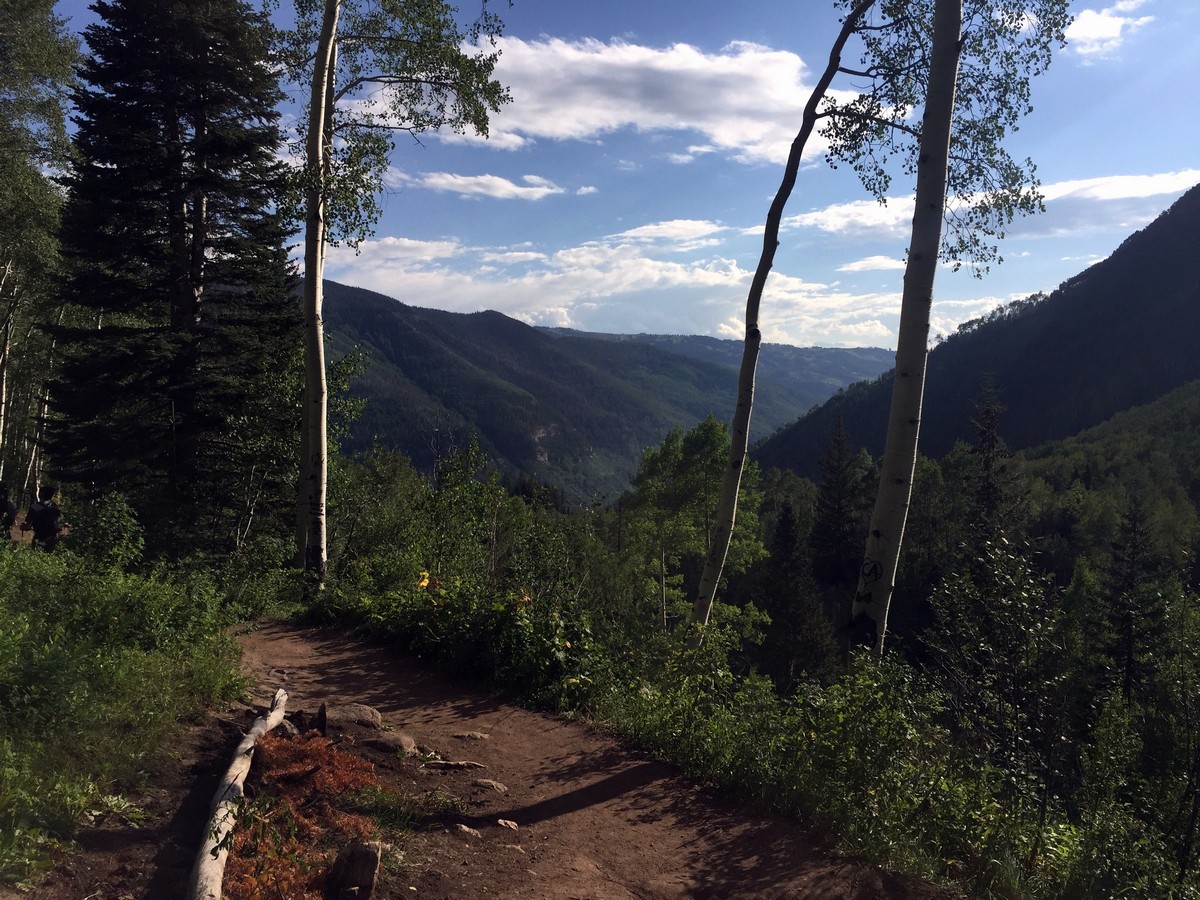 Hiking down the valley on the Booth Falls Trail Hike near Vail, Colorado