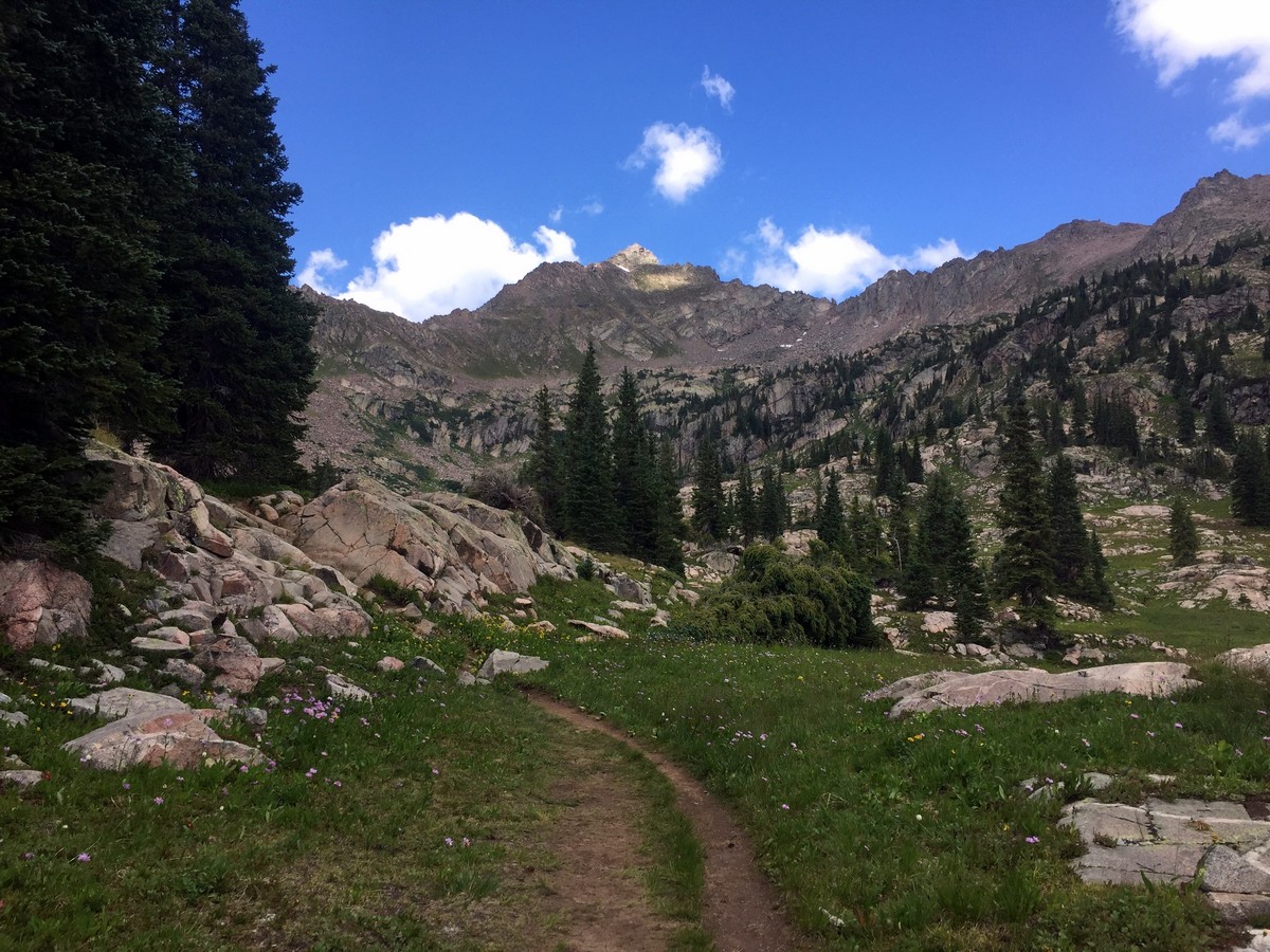 Granite cliffs behind the trail on the Pitkin Lake Trail Hike near Vail, Colorado