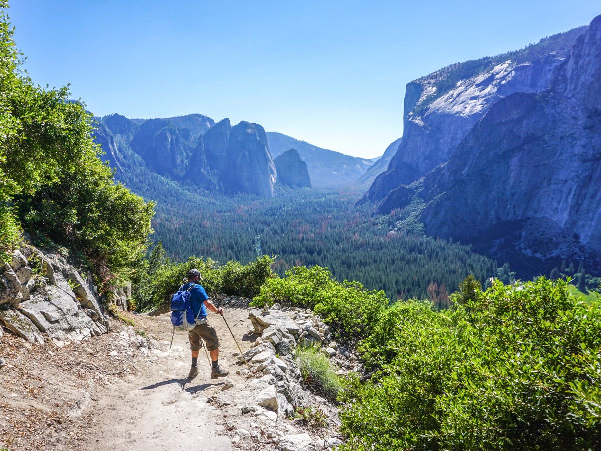 Hiker and beautiful views on Yosemite Boot Route trail in Yosemite National Park