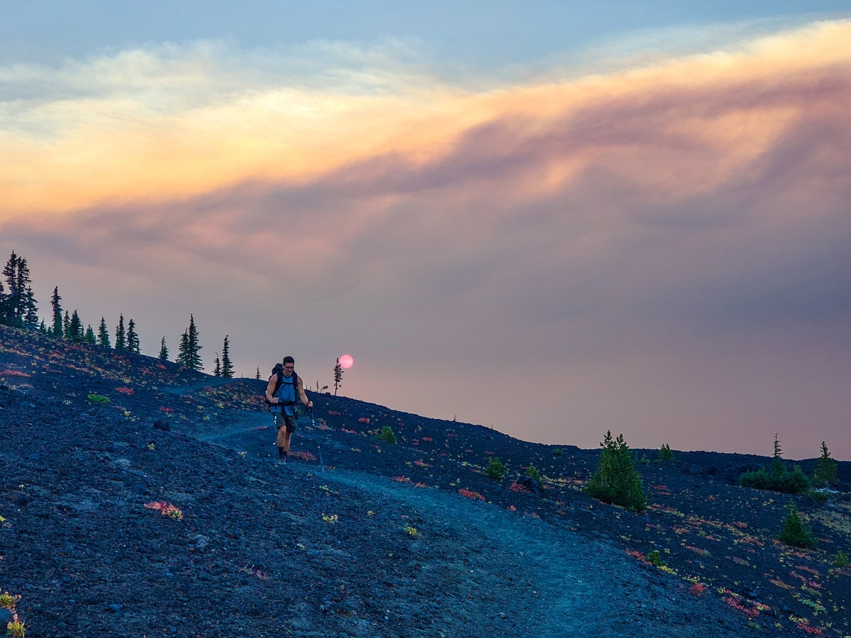 Hiker and the beautiful sunset on the Pacific Crest Trail