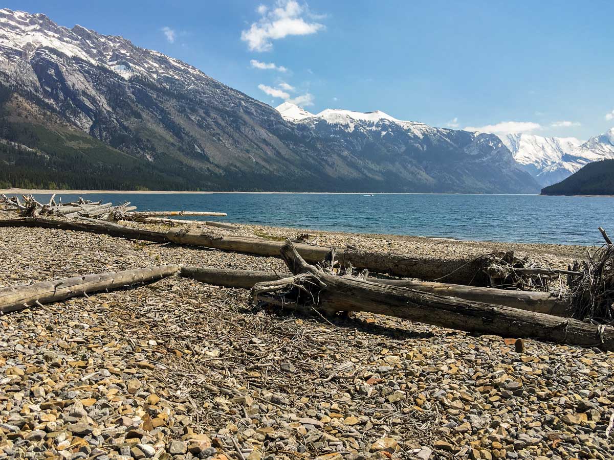 A pretty beach on Lake Minnewanka backpacking trail in Banff National Park