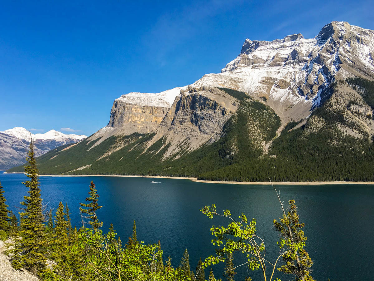 Beautiful mountains along Lake Minnewanka backpacking trail in Banff National Park