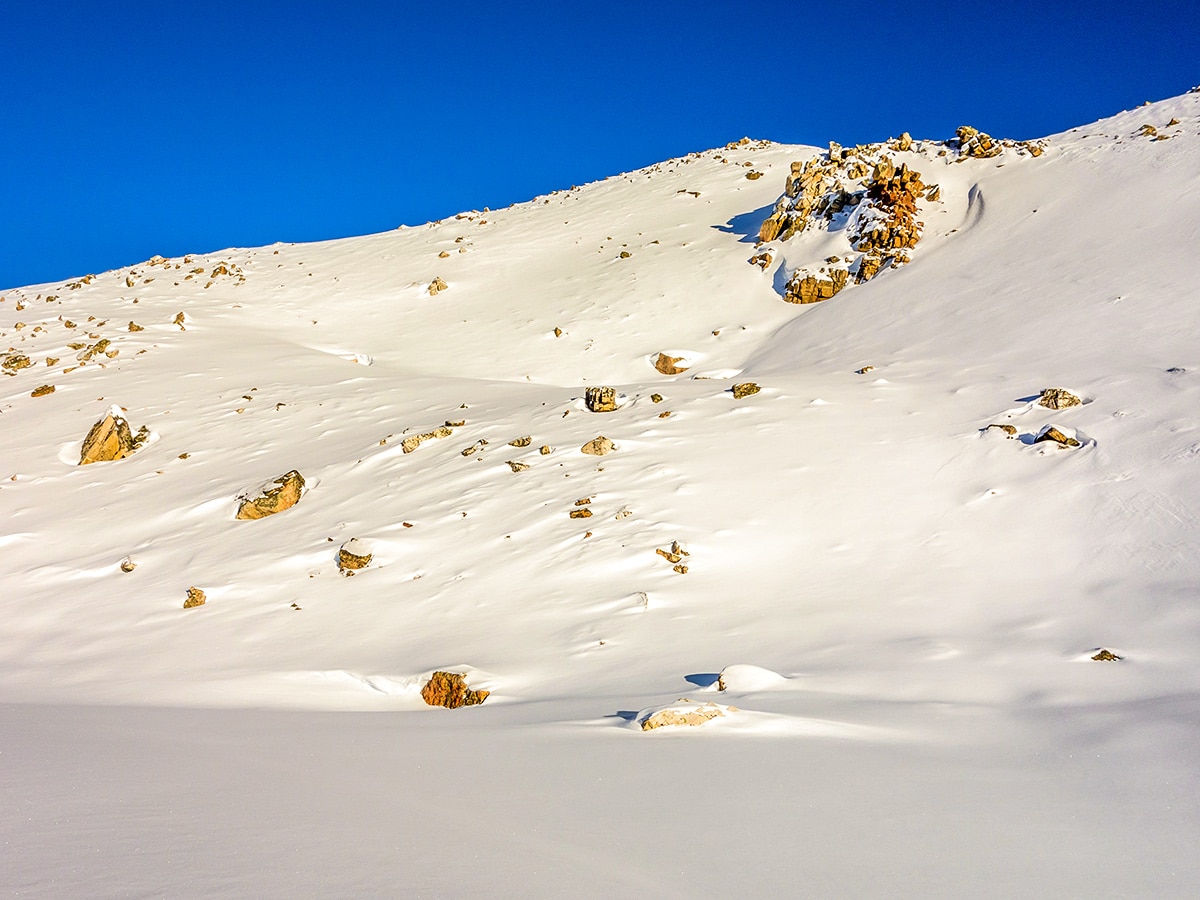 Tricky avalanche slopes on Crystal Ridge snowshoe trail Banff National Park