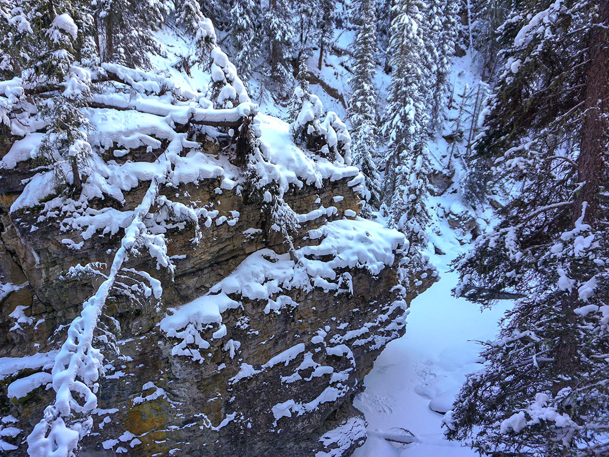 Approaching the Lower Falls on Johnston Canyon snowshoe trail in Banff National Park