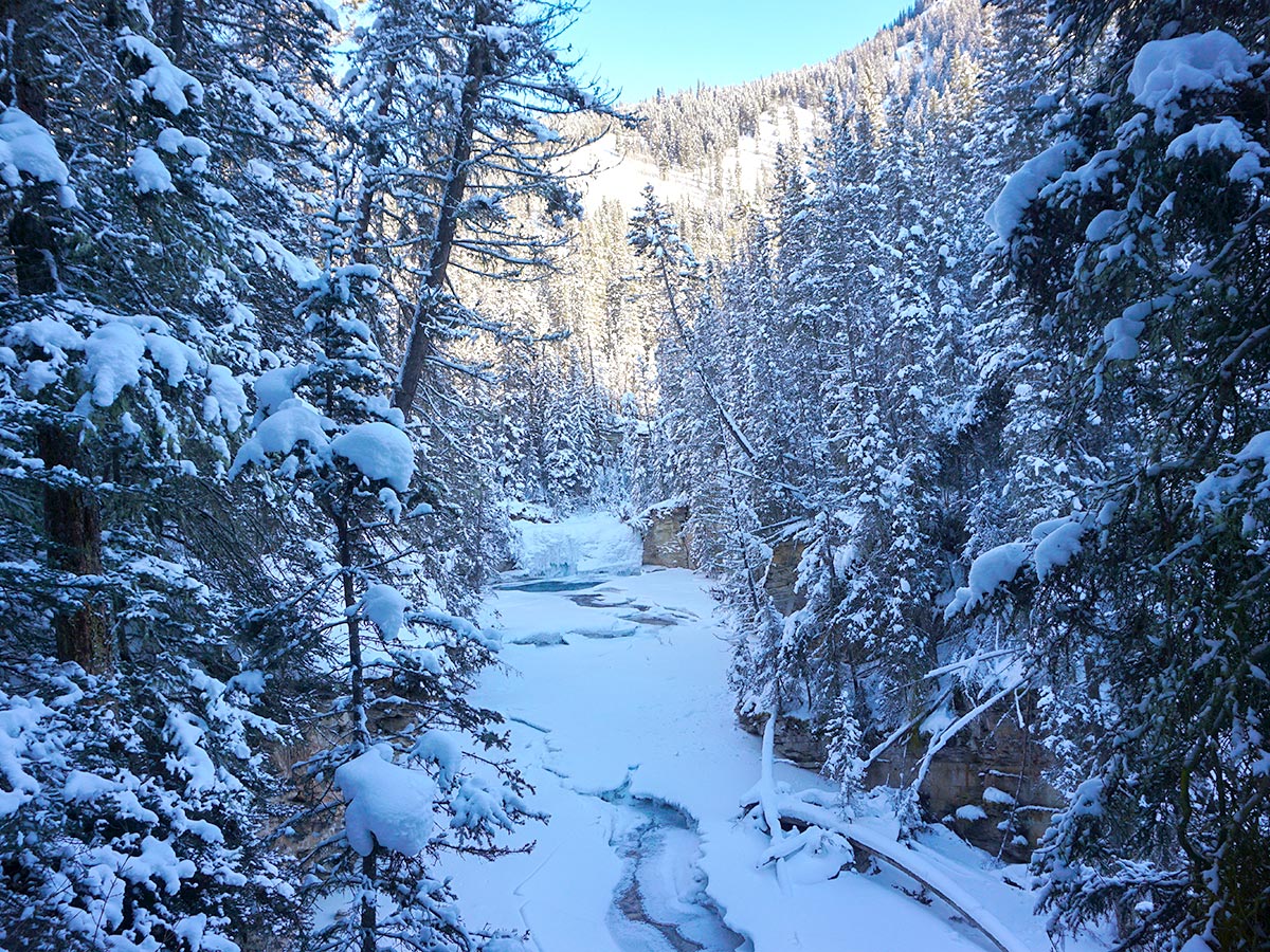 Approaching the Upper Falls on Johnston Canyon snowshoe trail in Banff National Park