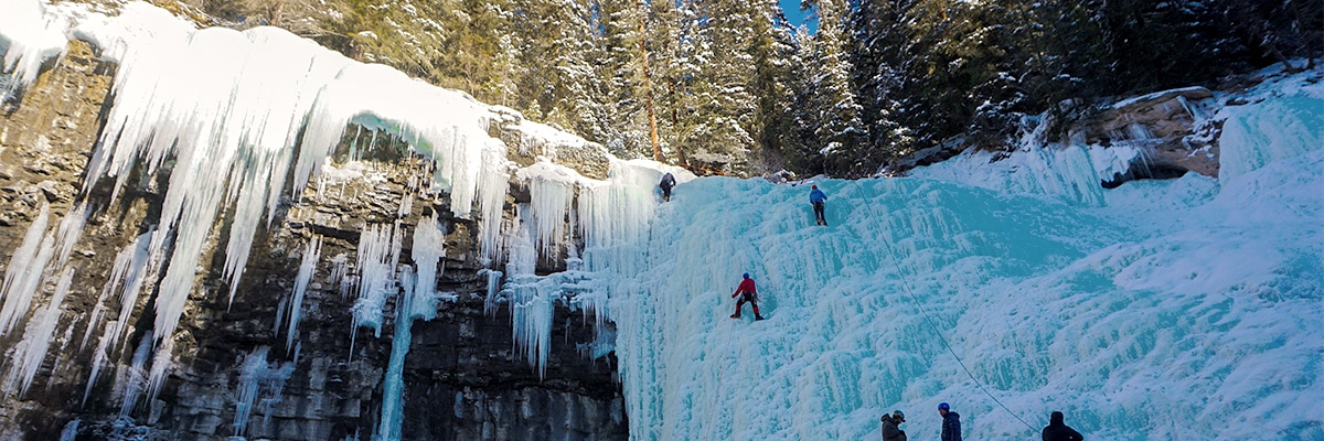Ice Climbing on Johnston Canyon snowshoe trail in Banff National Park