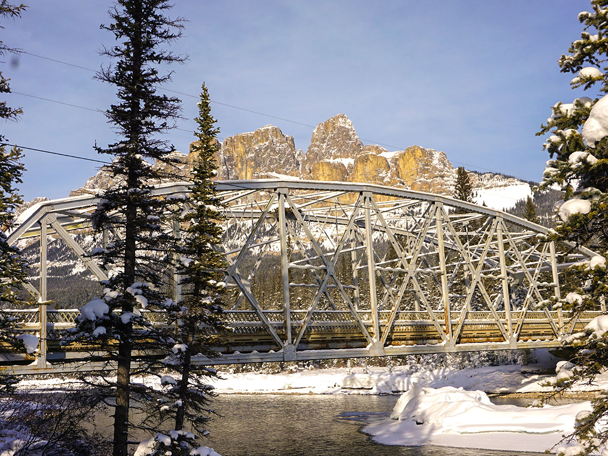 The bridge at Castle Junction on Johnston Canyon snowshoe trail in Banff National Park