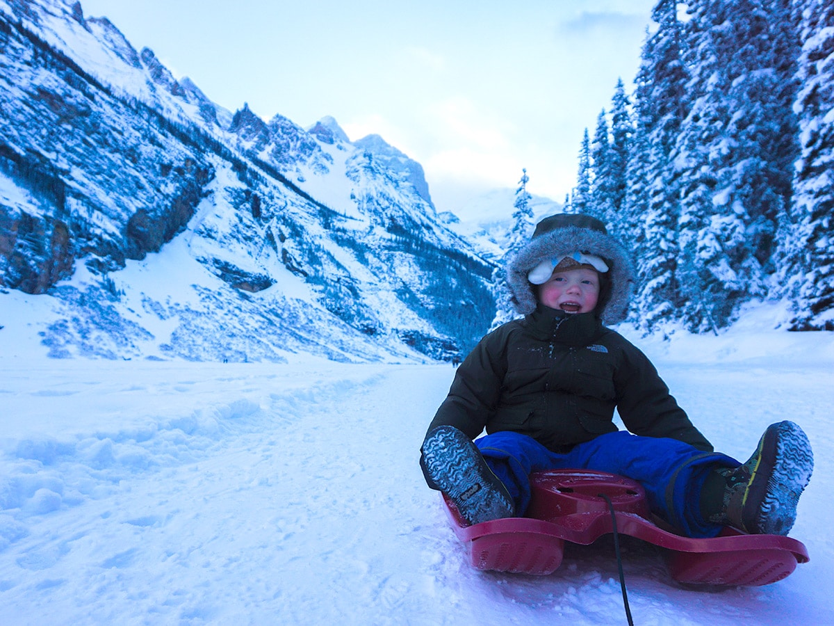 Sleigh ride on Lake Louise snowshoe trail in Banff National Park