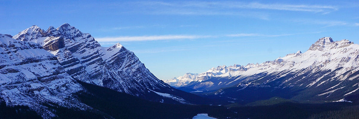 Panoramic views from Peyto Lake Viewpoint snowshoe trail in Banff National Park