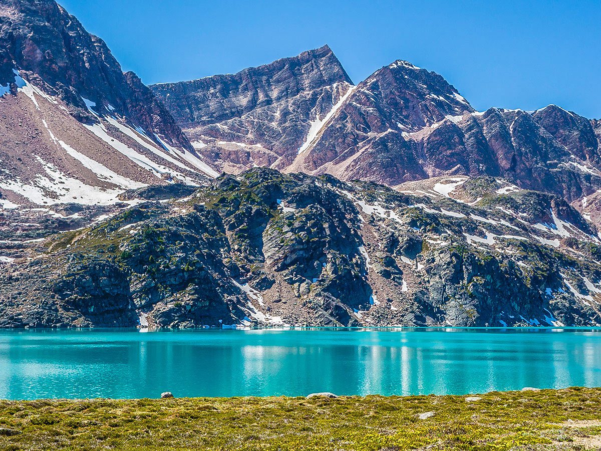 Stunning turquoise lake on Maligne Pass and Replica Peak backpacking trail in Jasper National Park