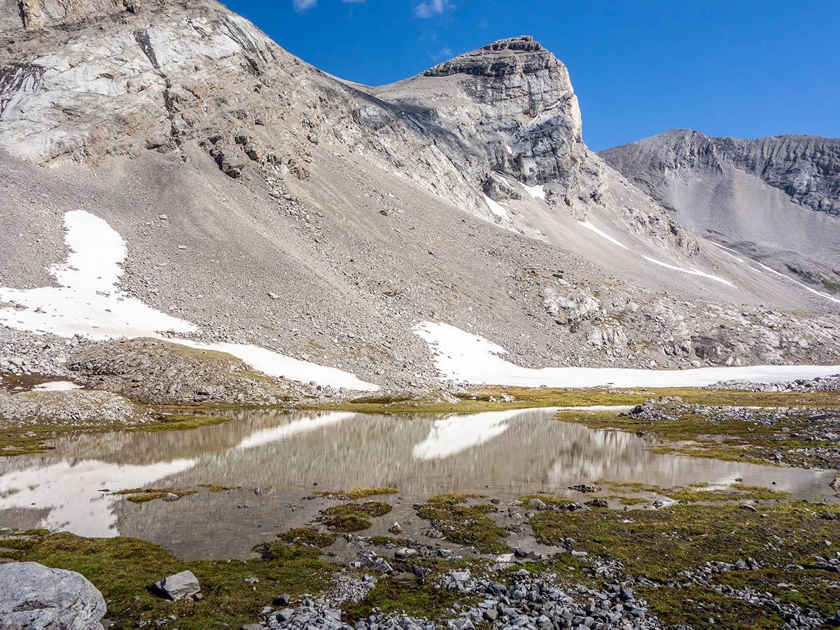 Beautiful tarn on Mount James Walker scramble in Kananaskis near Canmore, the Canadian Rockies