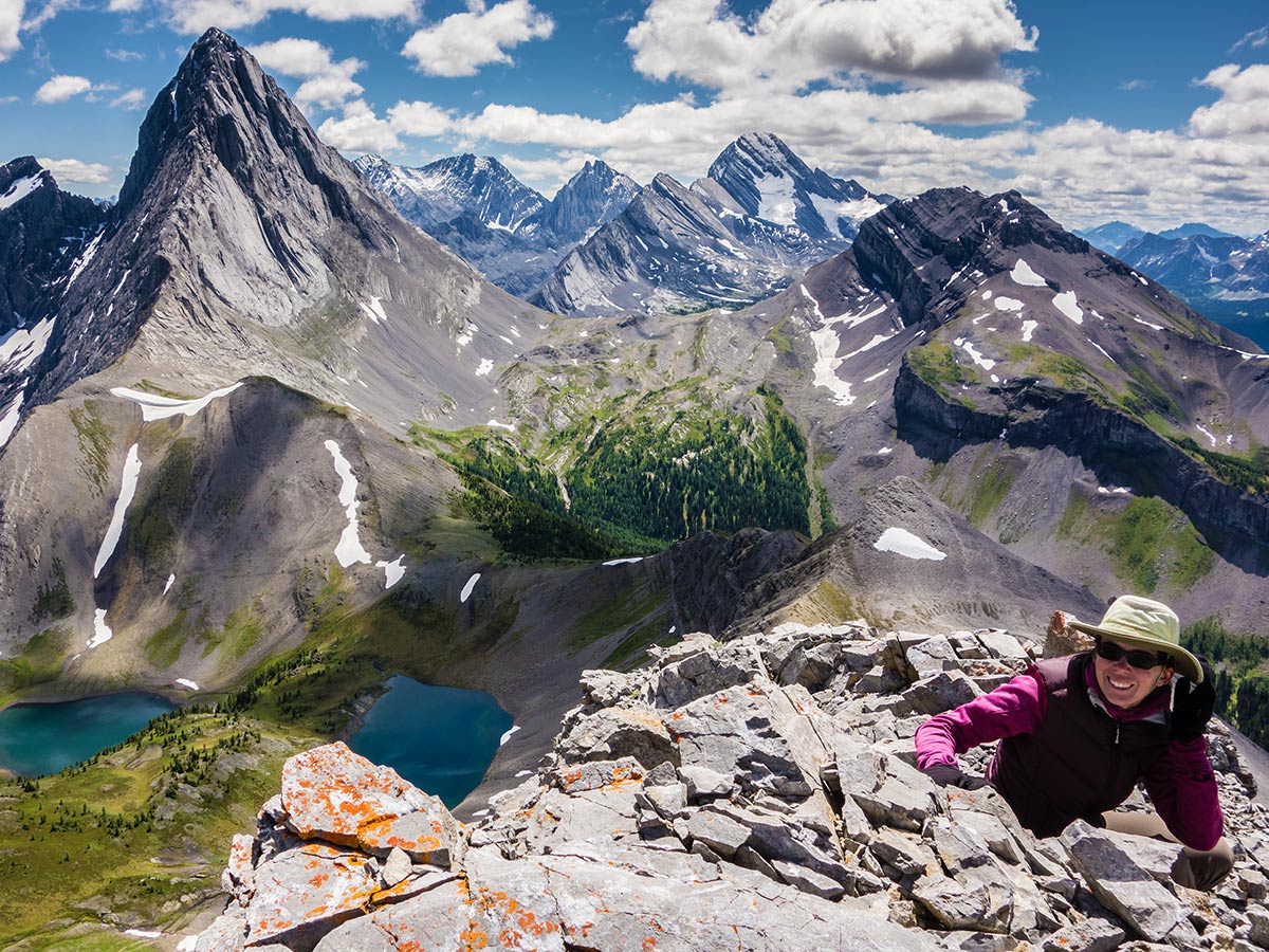 Happy hiker on Smutwood Peak scramble in Kananaskis near Canmore, the Canadian Rockies