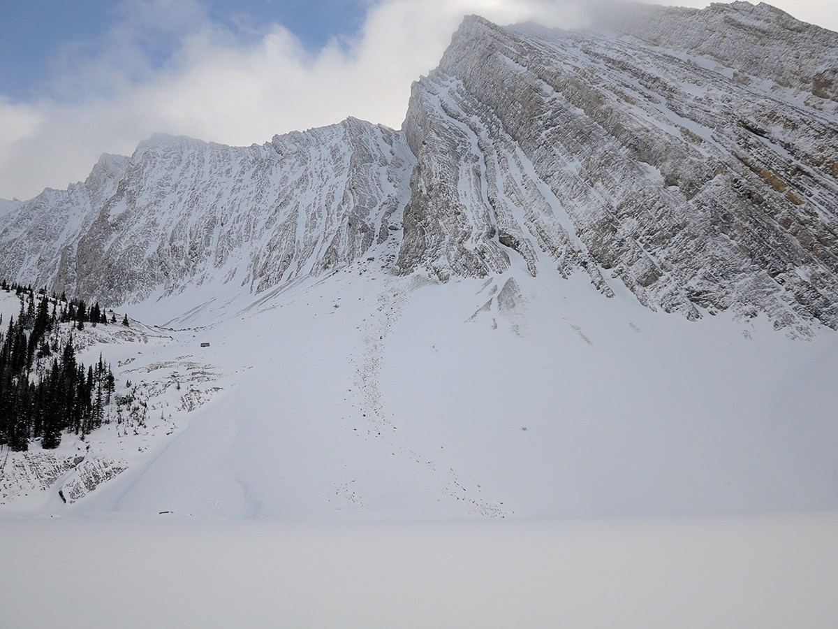 Mount Chester and the frozen lake on Chester Lake snowshoe trail in Kananaskis near Canmore