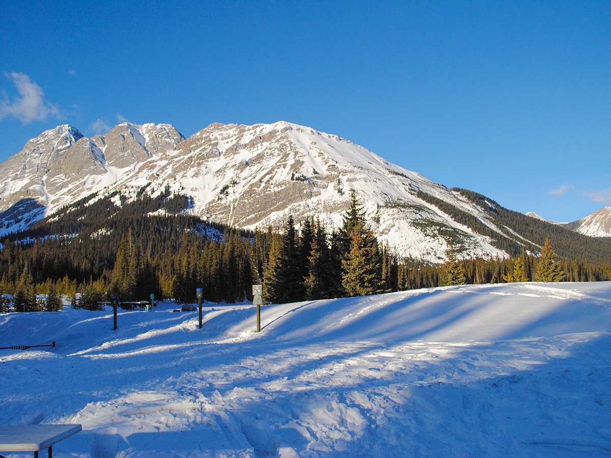 View from parking lot on Hogarth Lakes snowshoe trail in Kananaskis near Canmore