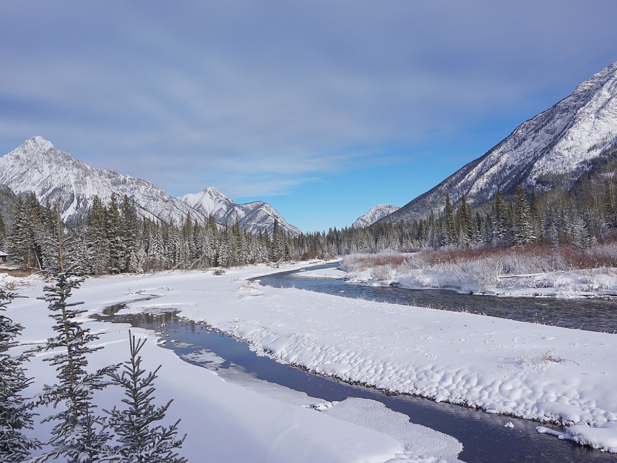 Views of Kananaskis River on Troll Falls and Hay Meadows snowshoe trail in Kananaskis near Canmore