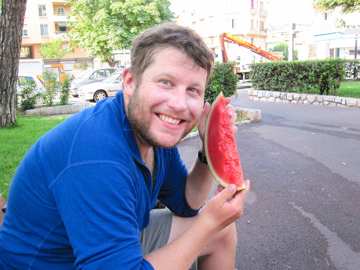 Eating watermelon in Nice on GR5 backpacking trip in Alps