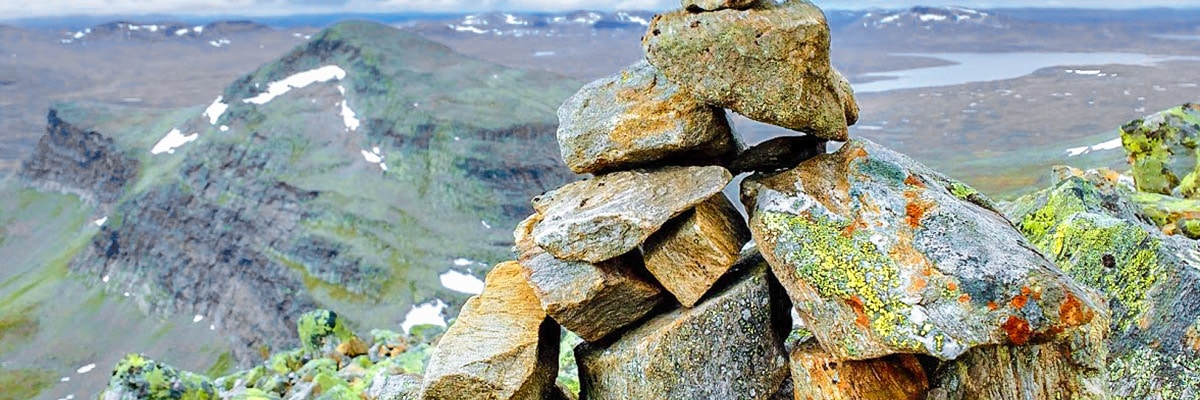 Stone cairn on the top of Helagstoppen hike in Åre, Sweden