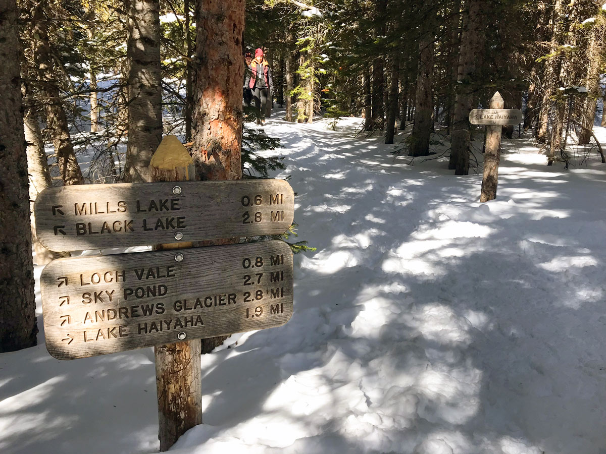 Sky Pond snowshoe trail in Rocky Mountain National Park is marked by direction signs