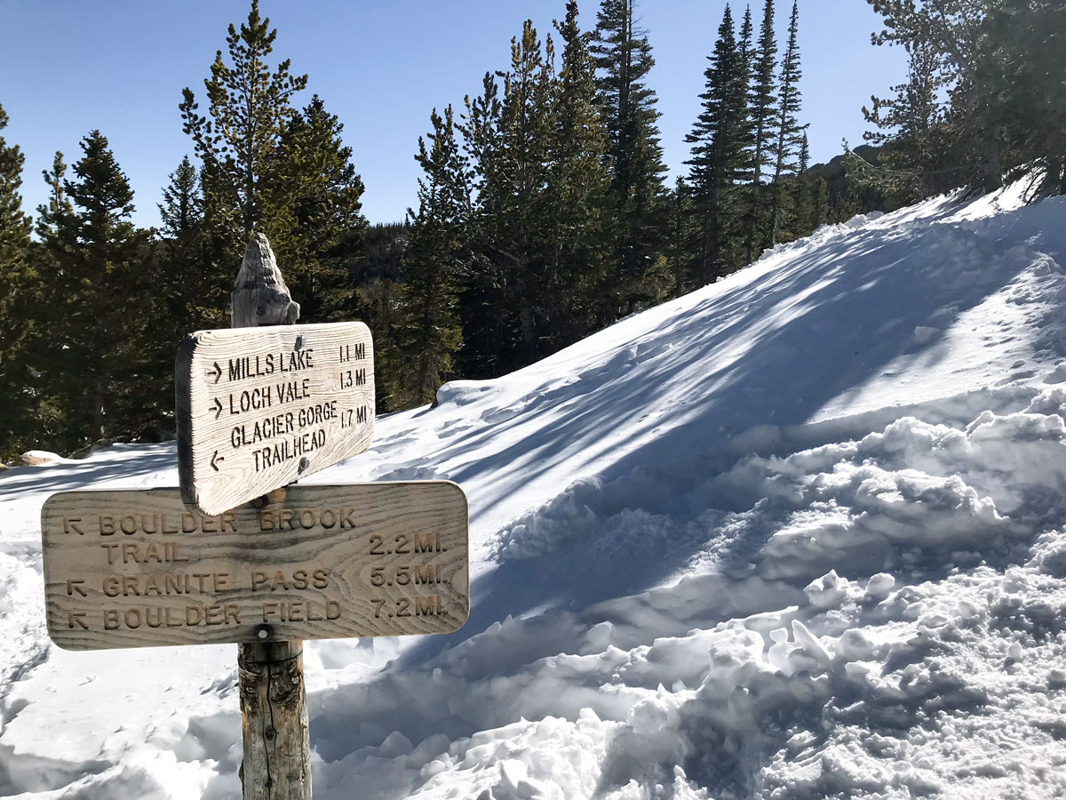 Signs on The Loch snowshoe trail in Rocky Mountain National Park, Colorado