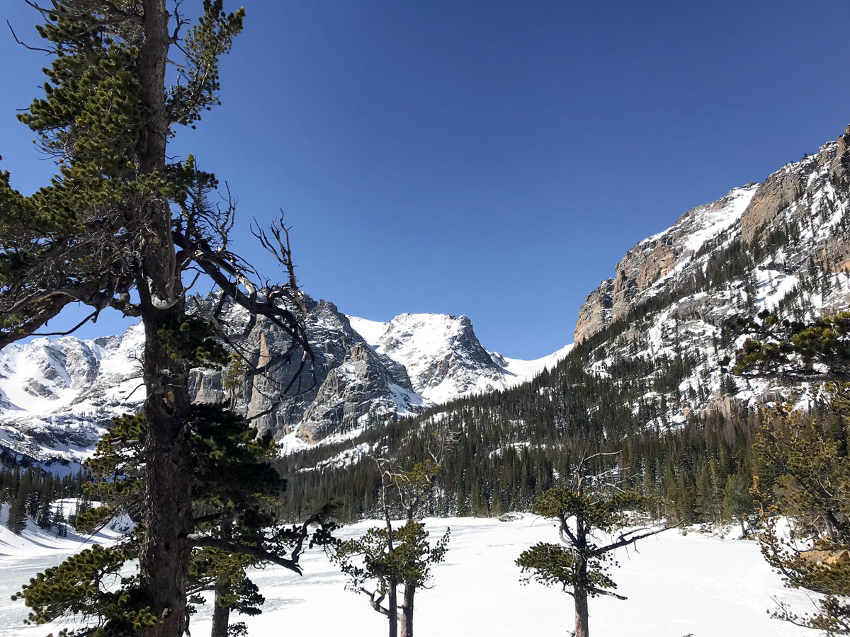 The Loch snowshoe trail in Rocky Mountain National Park covered by snow