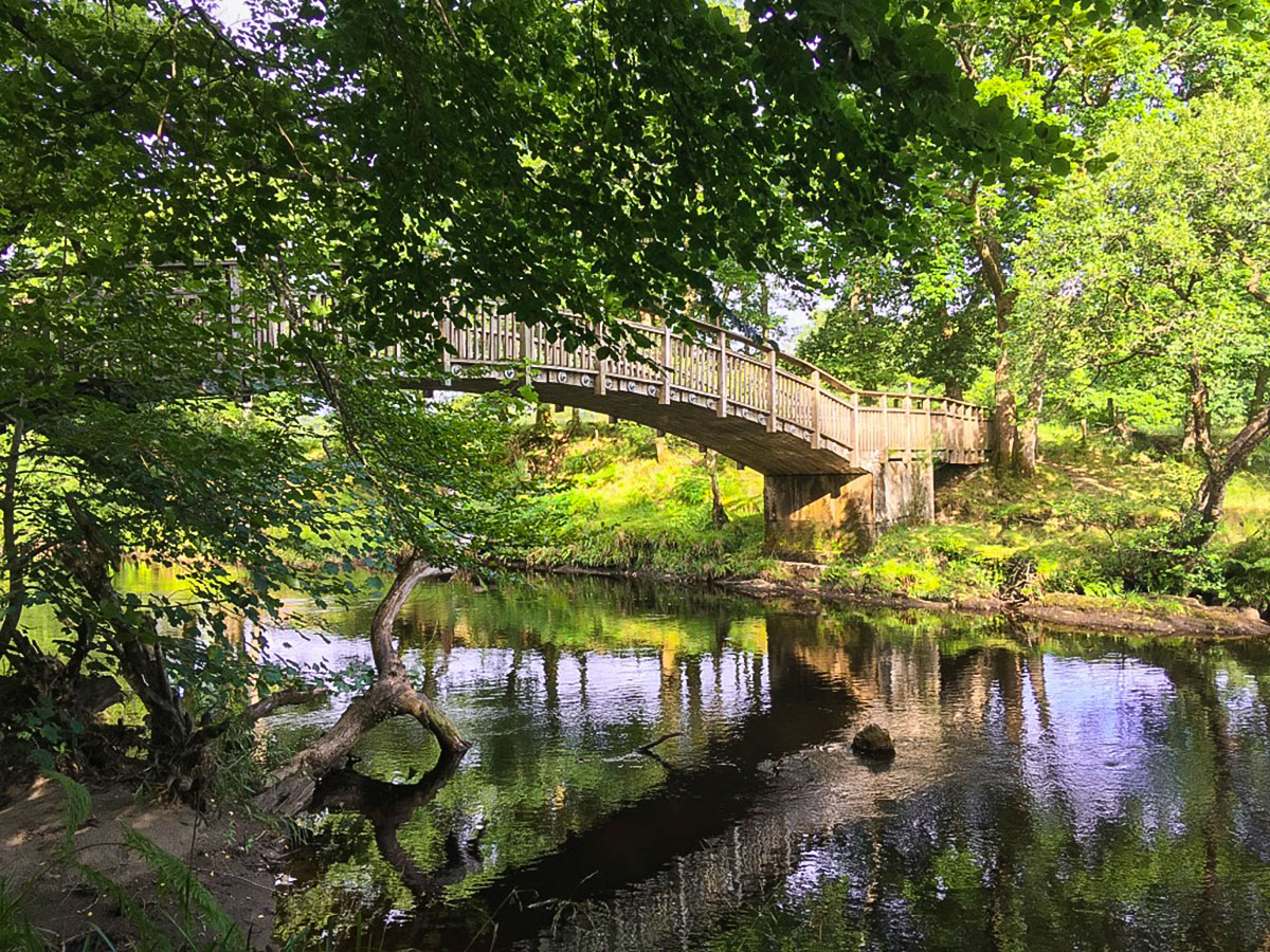 Bridge over the River Forth on Doon Hill Fairy Trail hike in Loch Lomond and The Trossachs region in Scotland