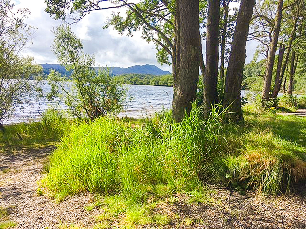 Sunny day on Loch Venachar hike in Loch Lomond and The Trossachs region in Scotland