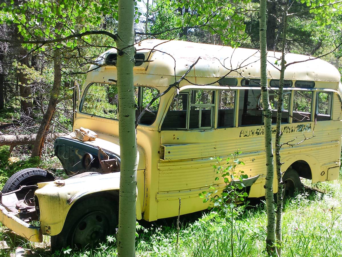 Old school bus on West Magnolia biking trail in Colorado