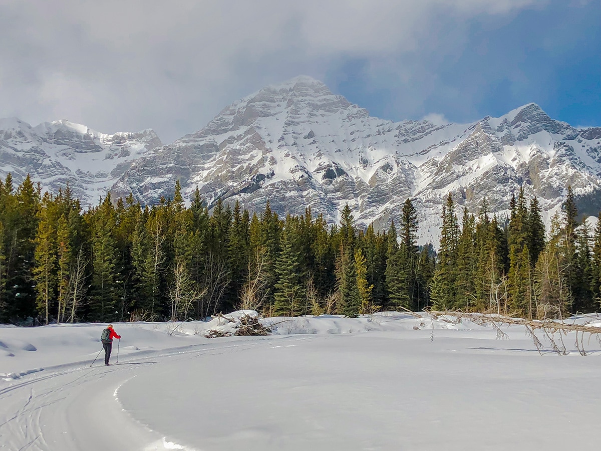 Snowy path of Evan-Thomas & Wedge Pond XC ski trail near Kananaskis in the Canadian Rockies