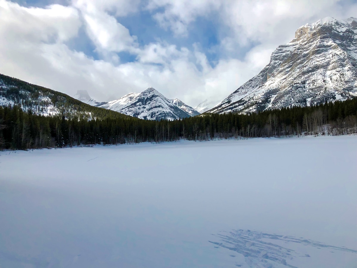 View over the lake on Evan-Thomas & Wedge Pond XC ski trail near Kananaskis in the Canadian Rockies