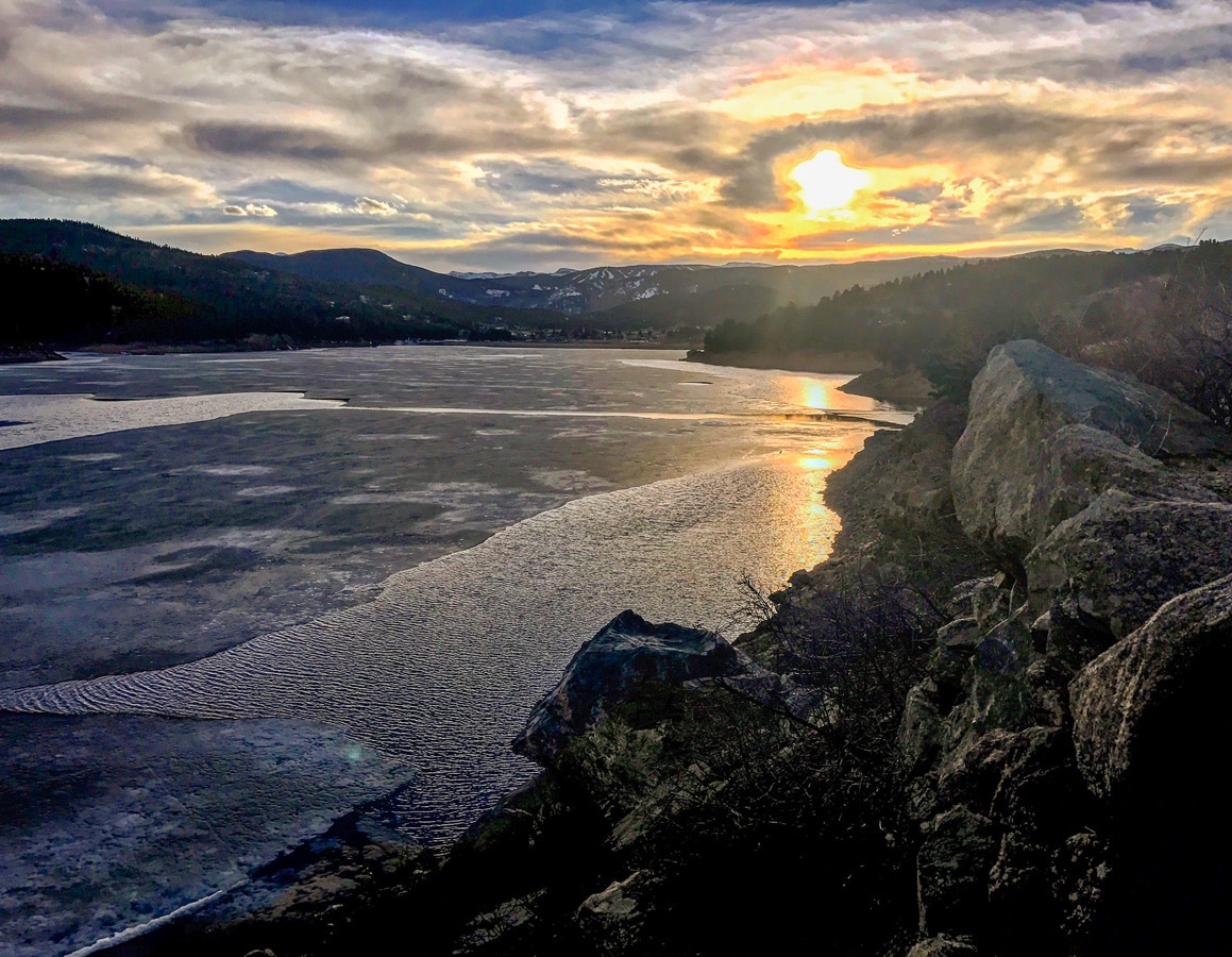 Sunset on Barker Reservoir snowshoe trail in Indian Peaks, Colorado