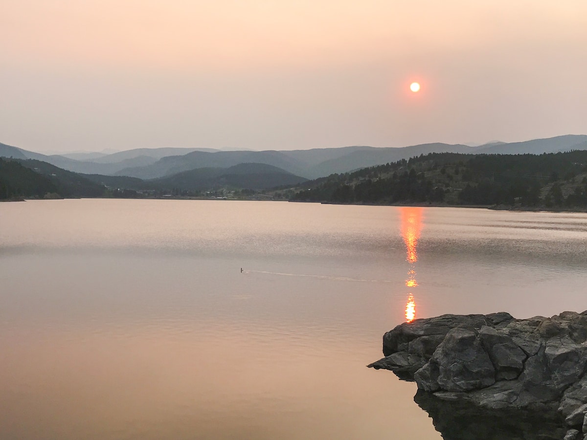 Sunset views on Barker Reservoir snowshoe trail in Indian Peaks, Colorado