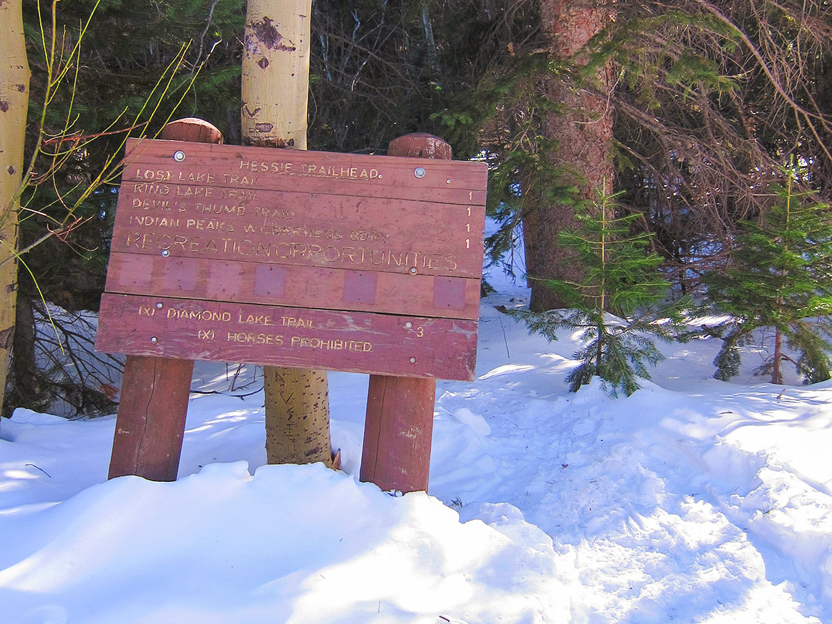 Signpost on Hessie snowshoe trail in Indian Peaks, Colorado