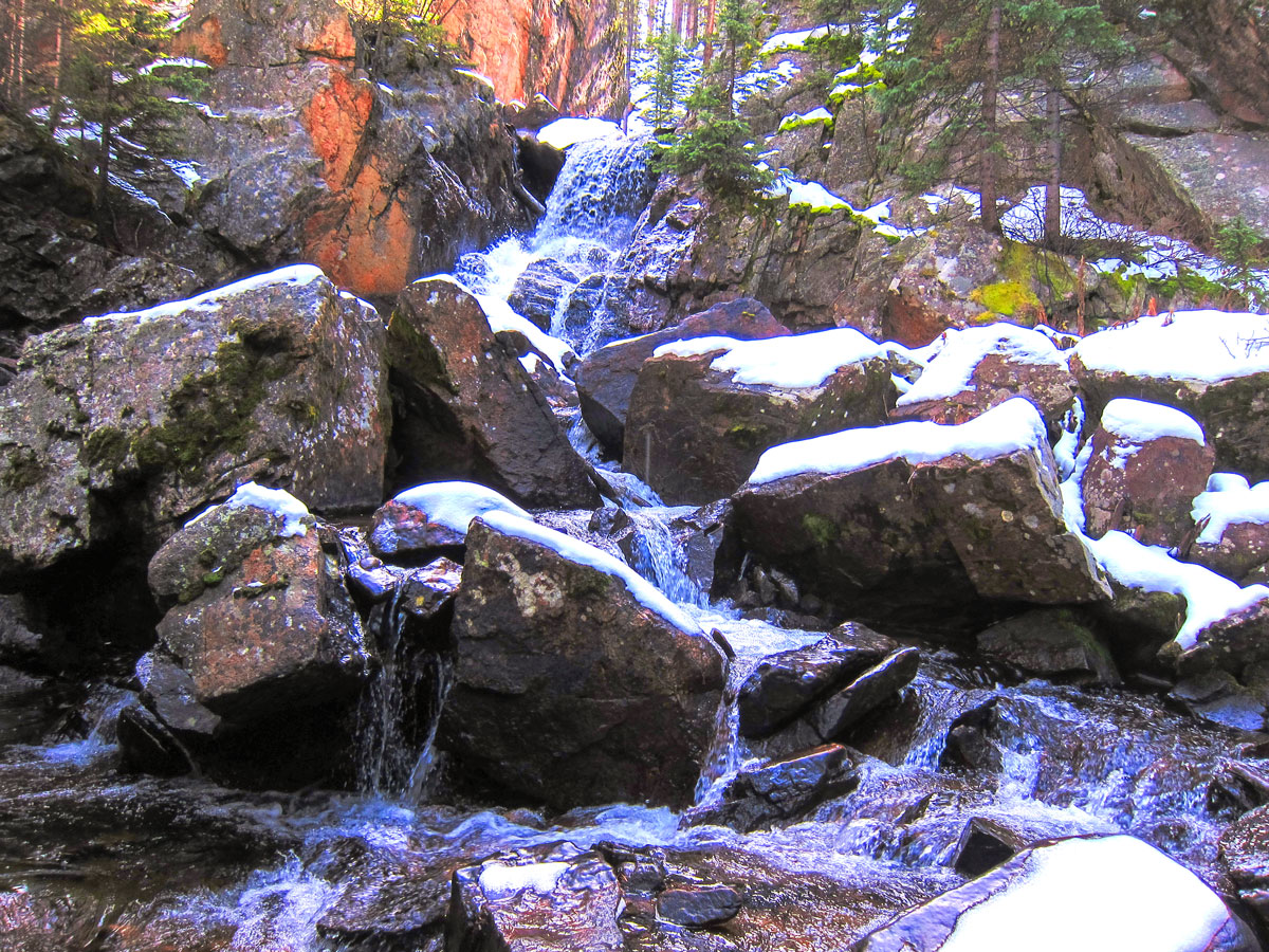 Waterfall on Lone Eagle Peak snowshoe trail in Indian Peaks, Colorado