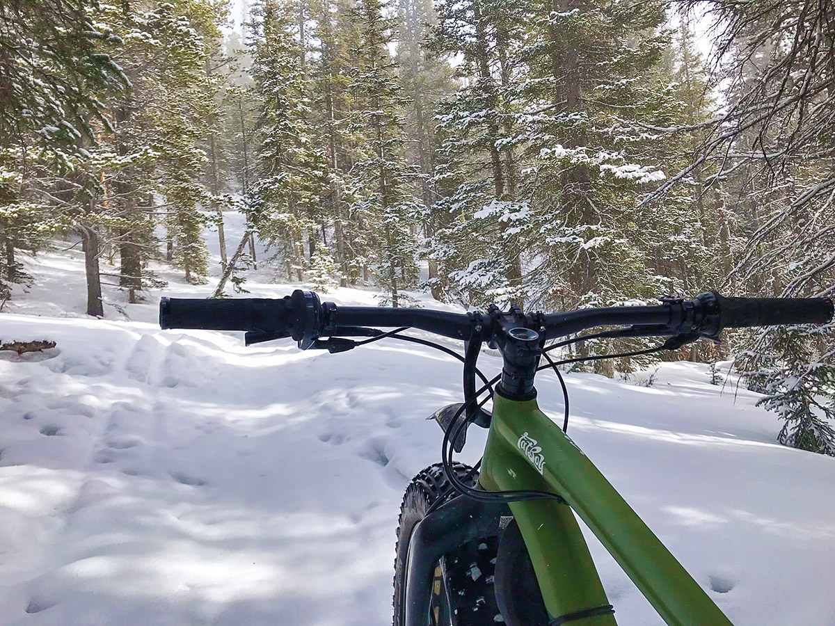Biking on Sourdough snowshoe trail in Indian Peaks, Colorado