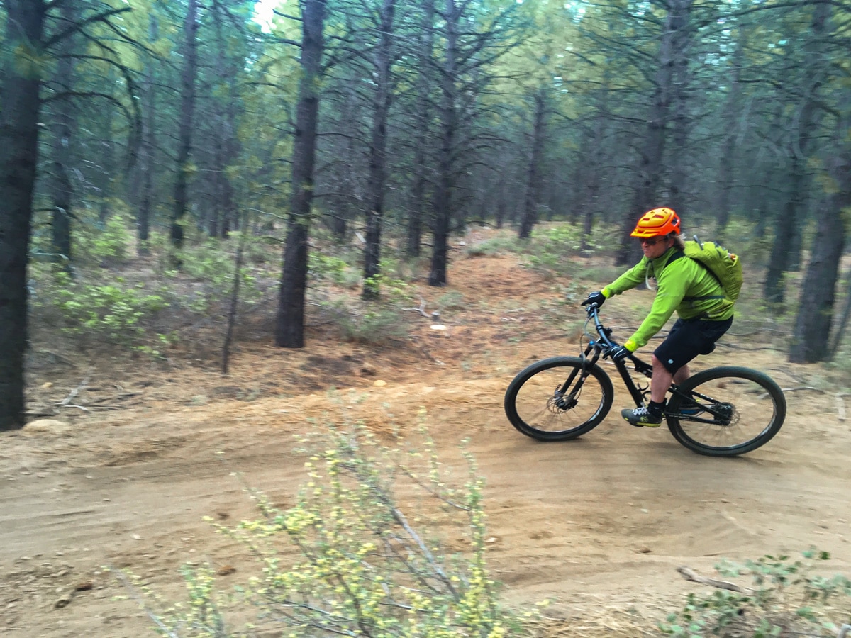 Biker on Whoops Loop mountain biking trail in Bend, Oregon