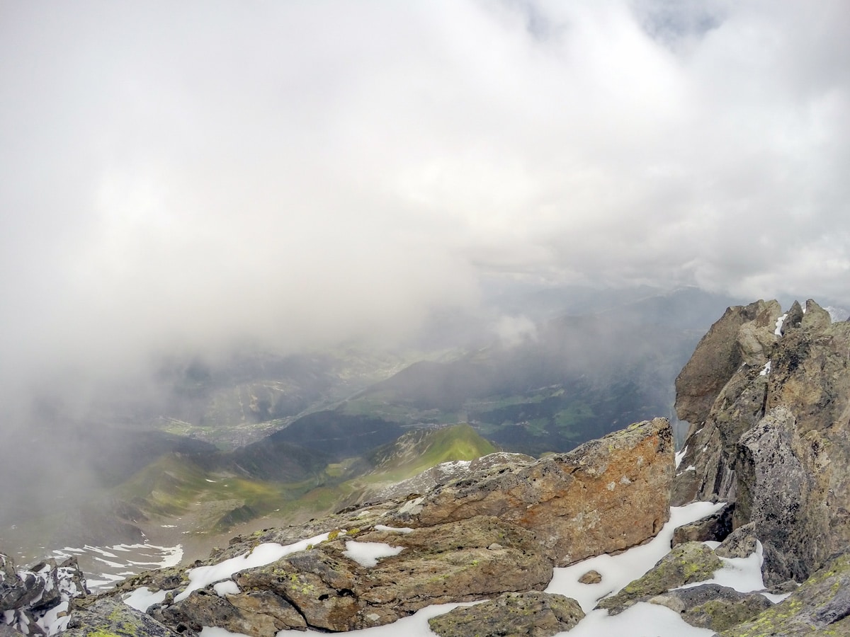 Foggy view from Ahornspitze hike near Mayrhofen, Zillertal Valley, Austria