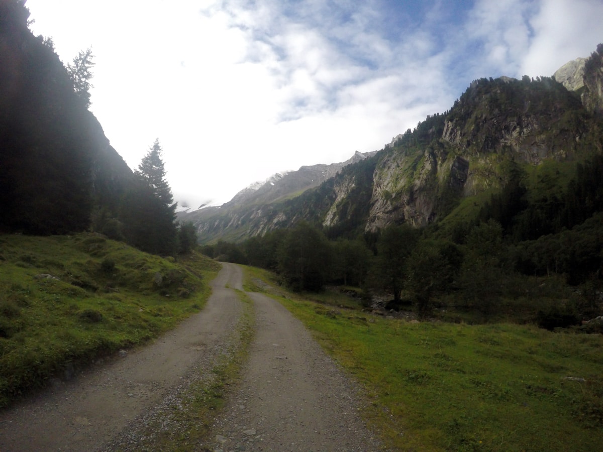 Following the gravel road on Berlinerhütte over Mörchnerscharte hike near Mayrhofen, Zillertal Valley, Austria