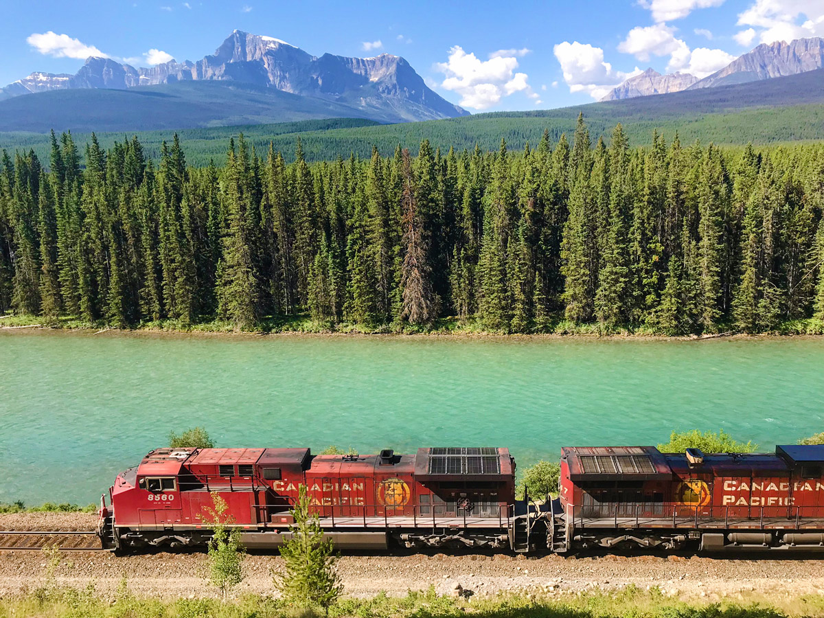 Jasper to Banff road biking route goes near train line and these views are common