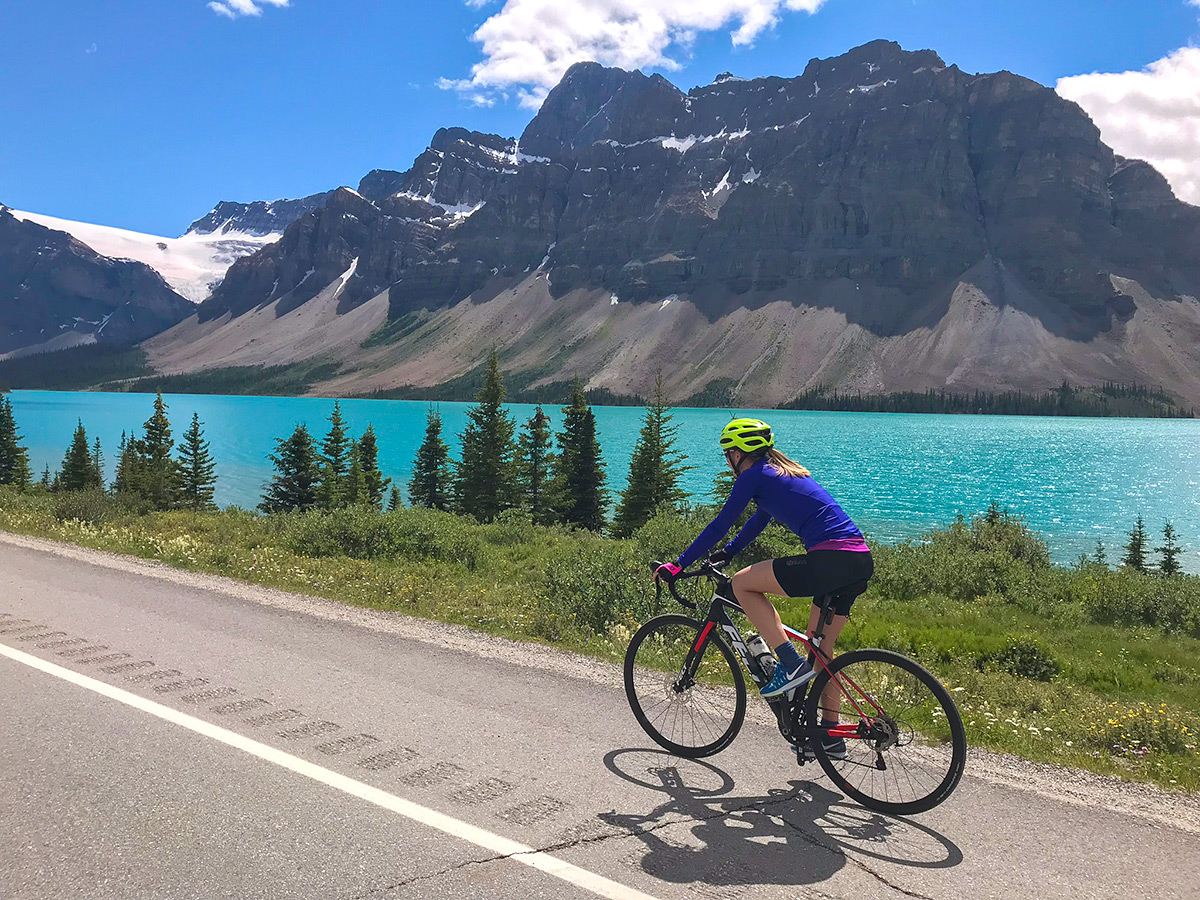 Cycling past Bow Lake on Lake Louise to Bow Summit and Back road biking route in Banff National Park
