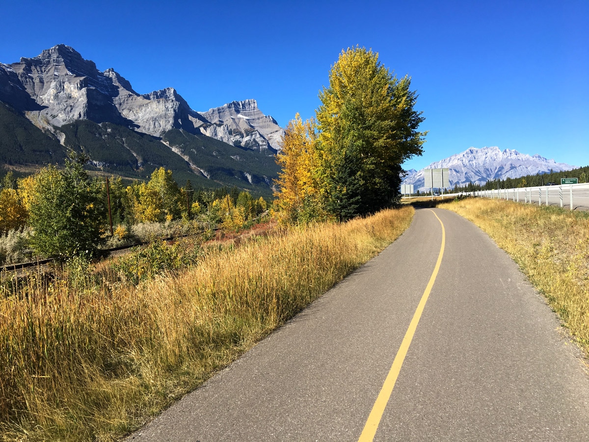 Heading out of Canmore on Legacy Trail from Canmore to Banff road biking route in the Canadian Rockies