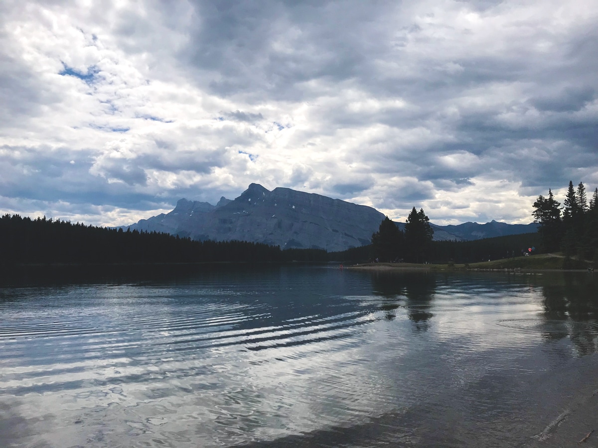 Two Jack Lake views on Minnewanka Loop road biking route in Banff National Park