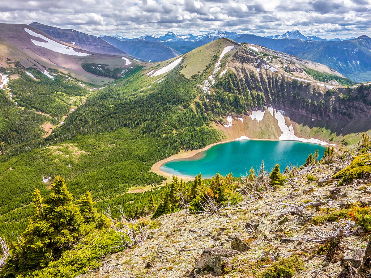 Looking down on Bovin Lake on Drywood Mountain Traverse scramble in Castle Provincial Park, Alberta