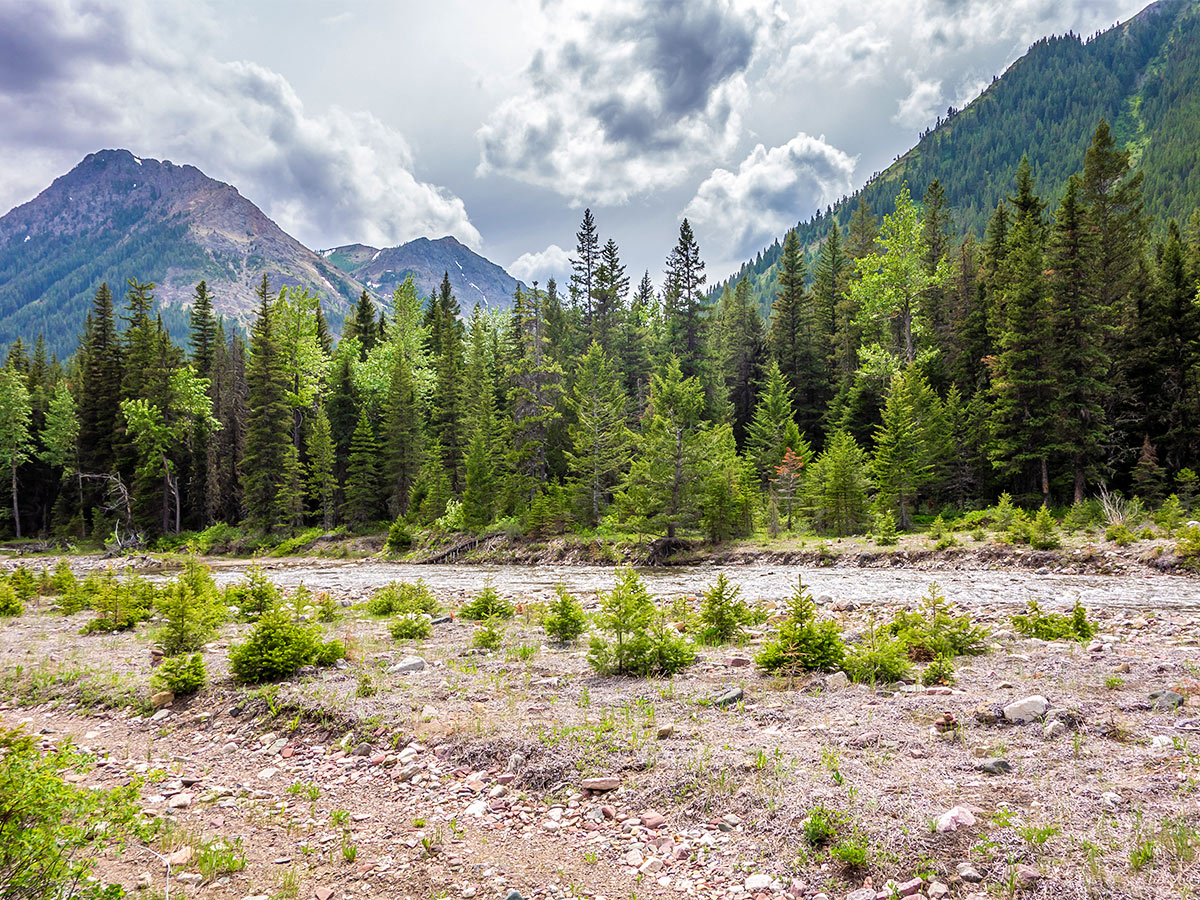 Crossing the creek on Mount Gladstone scramble in Castle Provincial Park, Alberta